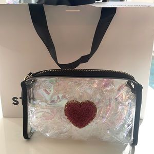 Stoney Clover black travel pouch with ruby glitter varsity patch